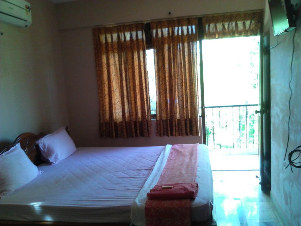 Menezes House Hotel Pangim Quarto foto